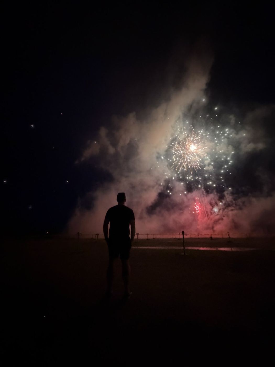 Matt White watching fireworks at an MLB drive-in activation